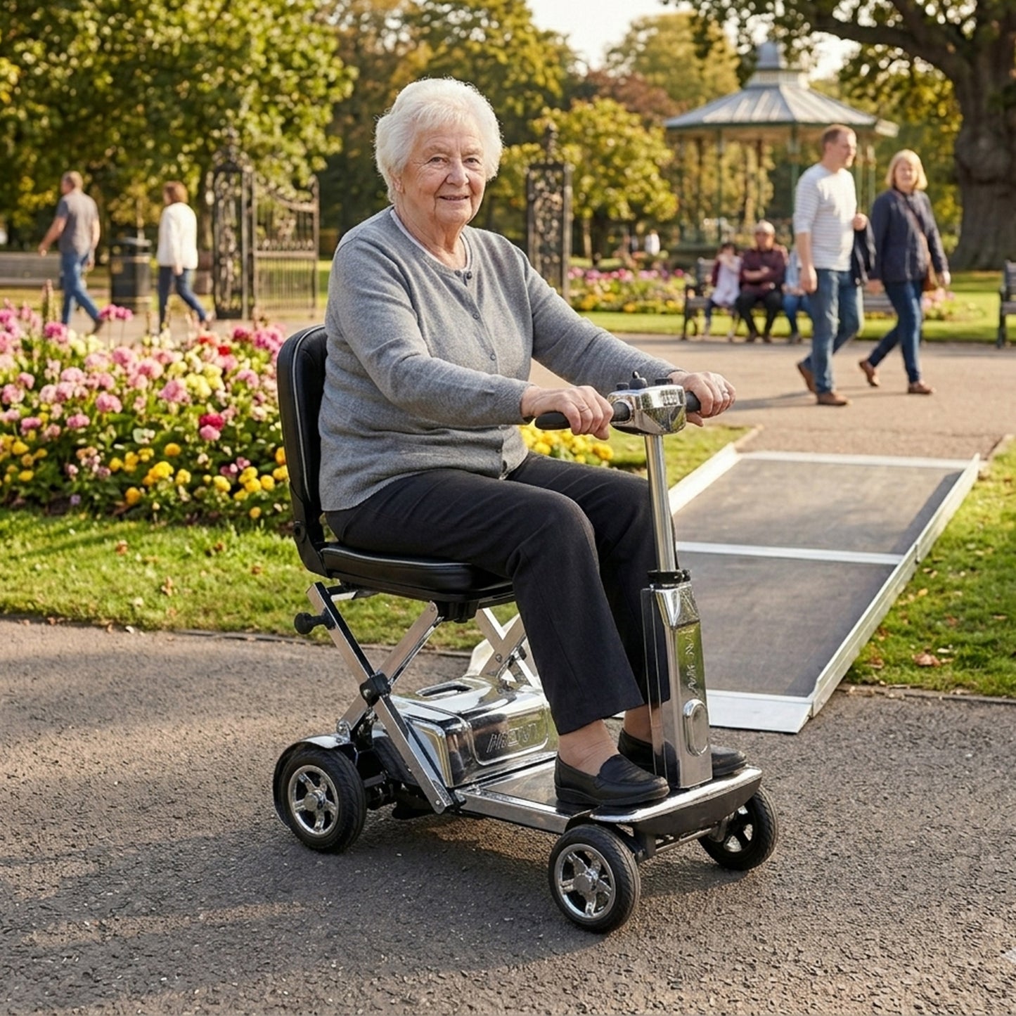 Senior woman using a mobility scooter in a park setting